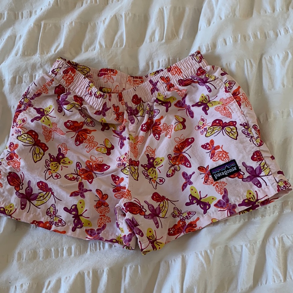 Never worn Girls Patagonia shorts, pink, butterflies, size 12m